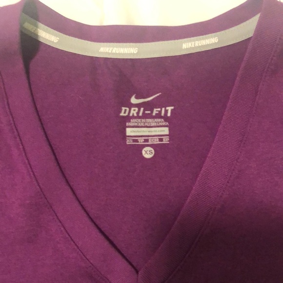 Nike running Dri-Fit T-shirt short sleeve in purple with Run saying and swoosh - Picture 2 of 7